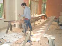Spencer West carving a stringer for the stairway